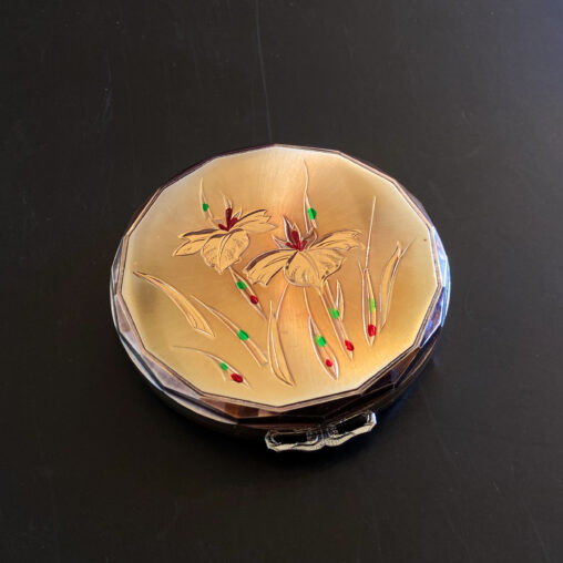 Vintage Japanese zogan compact by Queen, Showa era (1950s–1960s), black surface with gold floral inlay.