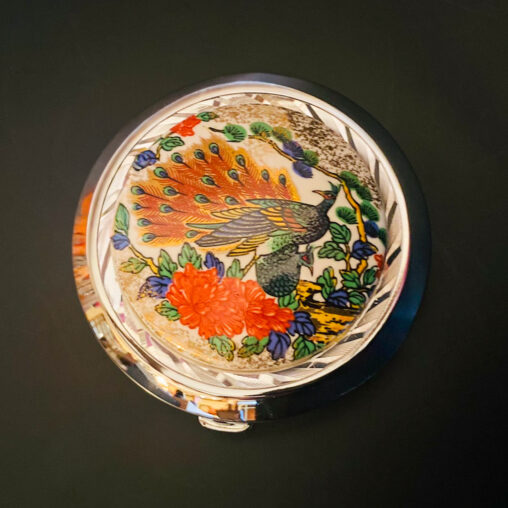 Kutani ware compact with hand-painted peacock and chrysanthemum design, Showa era Japanese porcelain