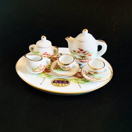 Arita miniature tea set with red and green maple leaf design, Showa era